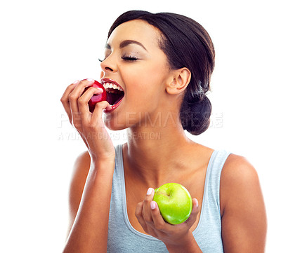 Buy stock photo Face, bite and woman with apple, nutrition and sustainable eating to lose weight in studio. Fruit, happy and girl with fresh food for detox diet, vitamins and gut health on white background.