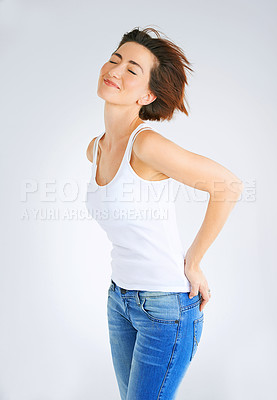 Buy stock photo Calm, girl and tank top for fashion in studio with mockup space, casual outfit and pride by white background. Confident, female person or smile with cool style, attitude or trendy by backdrop