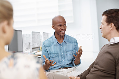 Buy stock photo Conversation, training and web development with business people in creative workplace for meeting. Collaboration, computer programming or explain with man and woman employee in office together