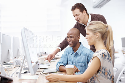 Buy stock photo Computer, discussion and web development with business people in creative workplace for meeting. Collaboration, conversation or pointing with man and woman programming employee in office together