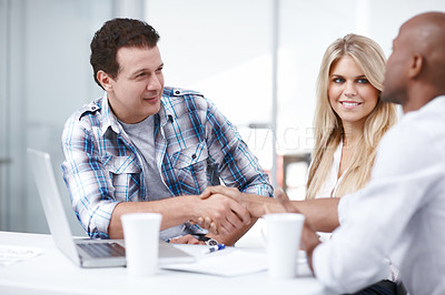Buy stock photo Business, people and team with handshake in office for b2b collaboration, sponsorship deal and onboarding. Organization, shaking hands and partnership with charity assistance in computer education