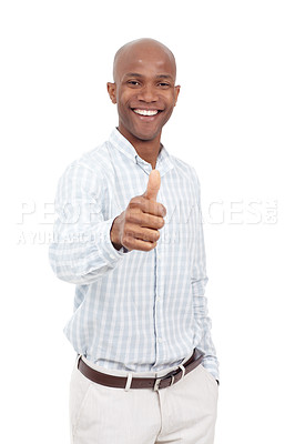 Buy stock photo Studio portrait of an excited young man giving a thumbs up to the camera