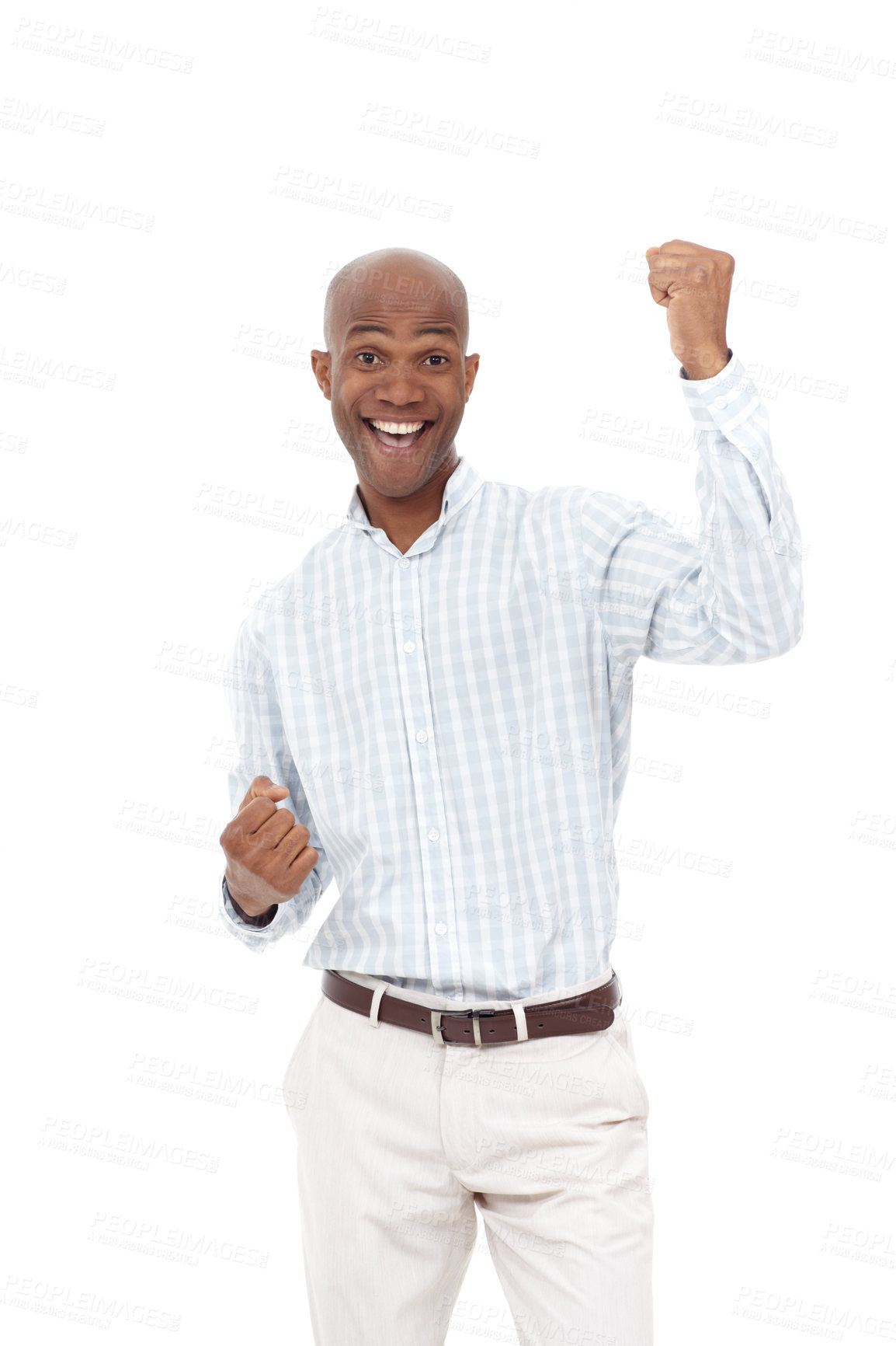 Buy stock photo Studio portrait of an excited young man raising his arms up in the air in celebration while smiling at the camera