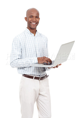 Buy stock photo Studio portrait of a casually dressed african american man holding a laptop and smiling at the camera