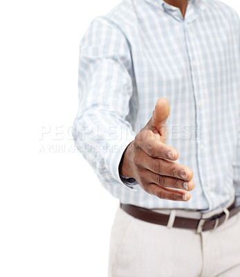 Buy stock photo Cropped studio shot of a young african american man making a handshake gesture twoards the camera and smiling
