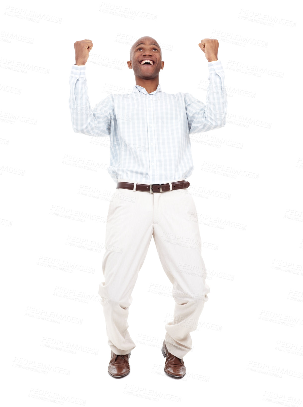 Buy stock photo Full length studio shot of a young african american man jumping in celebration isolated on white