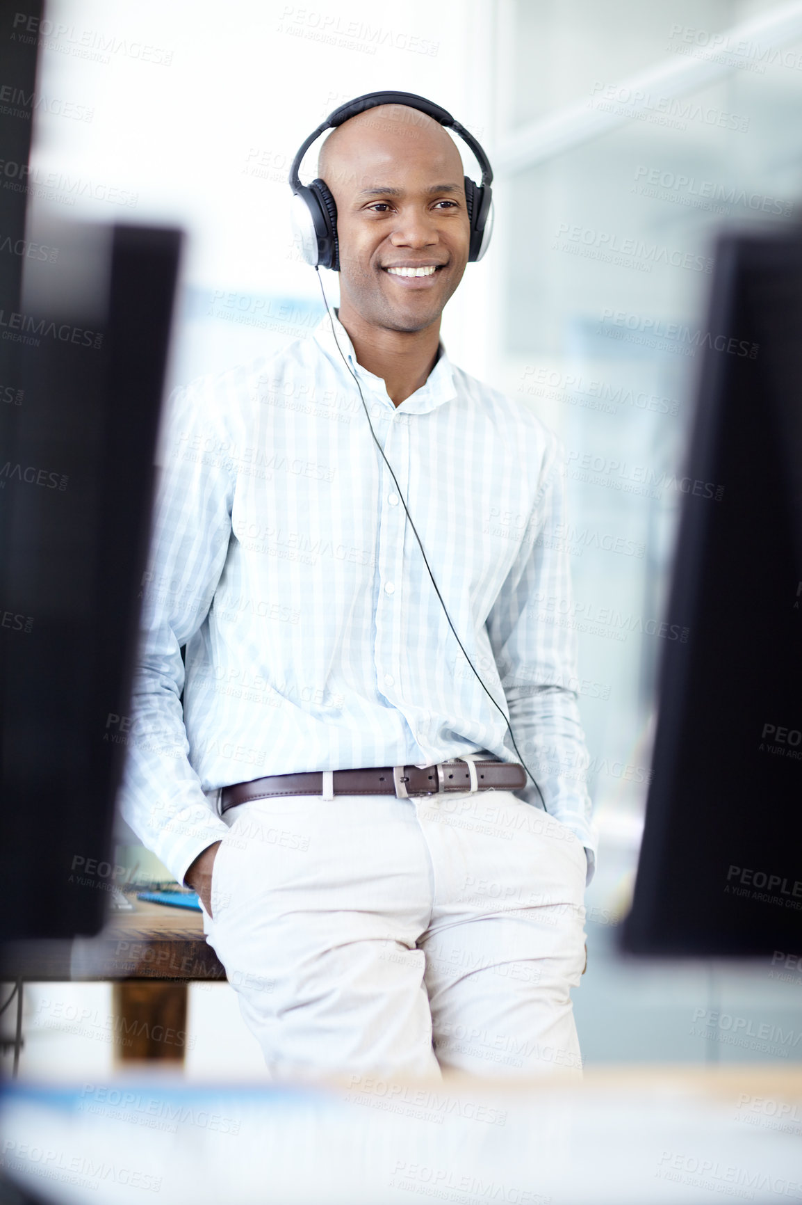 Buy stock photo Business, black man and smile with headphones in office for watching online video and listening to music. Designer, person and happy by desk with streaming subscription, work break and radio playlist
