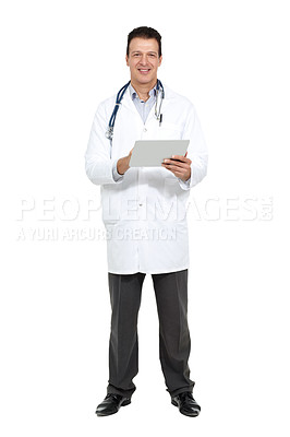 Buy stock photo Full length studio portrait of a smiling doctor holding a digital tablet and smiling at the camera