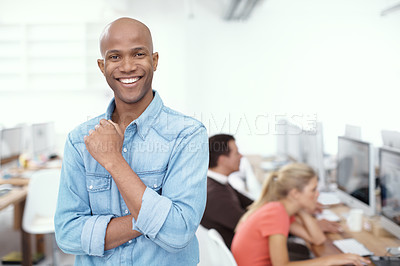 Buy stock photo Portrait of a young businessman smiling in the office