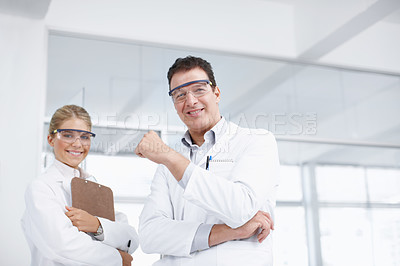 Buy stock photo Portrait of two scientists smiling in the lab