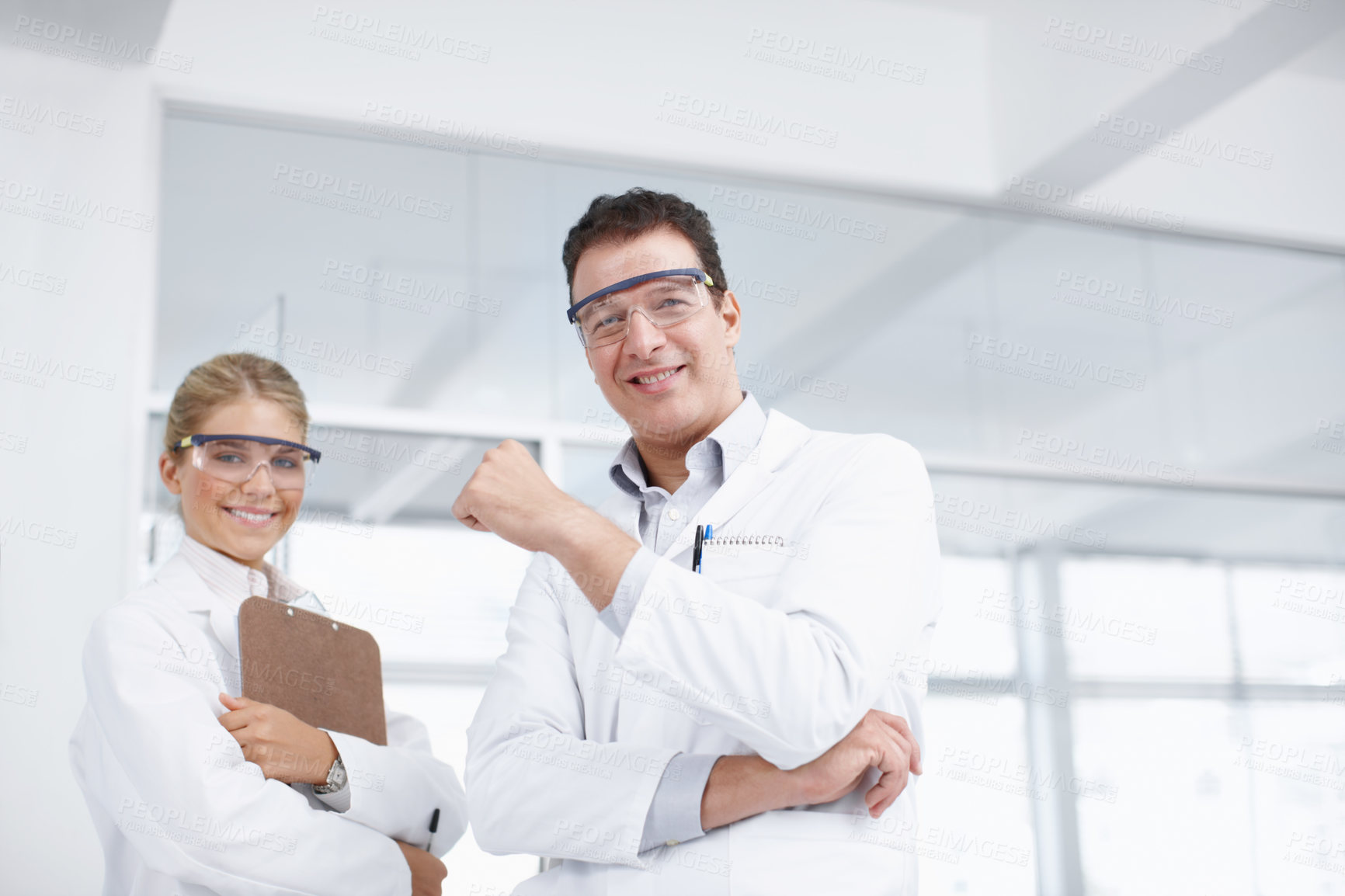 Buy stock photo Portrait, man and woman in laboratory with smile, collaboration and confidence in science study. Happy, scientist and medical team with research in biotech, pharmaceutical innovation or development