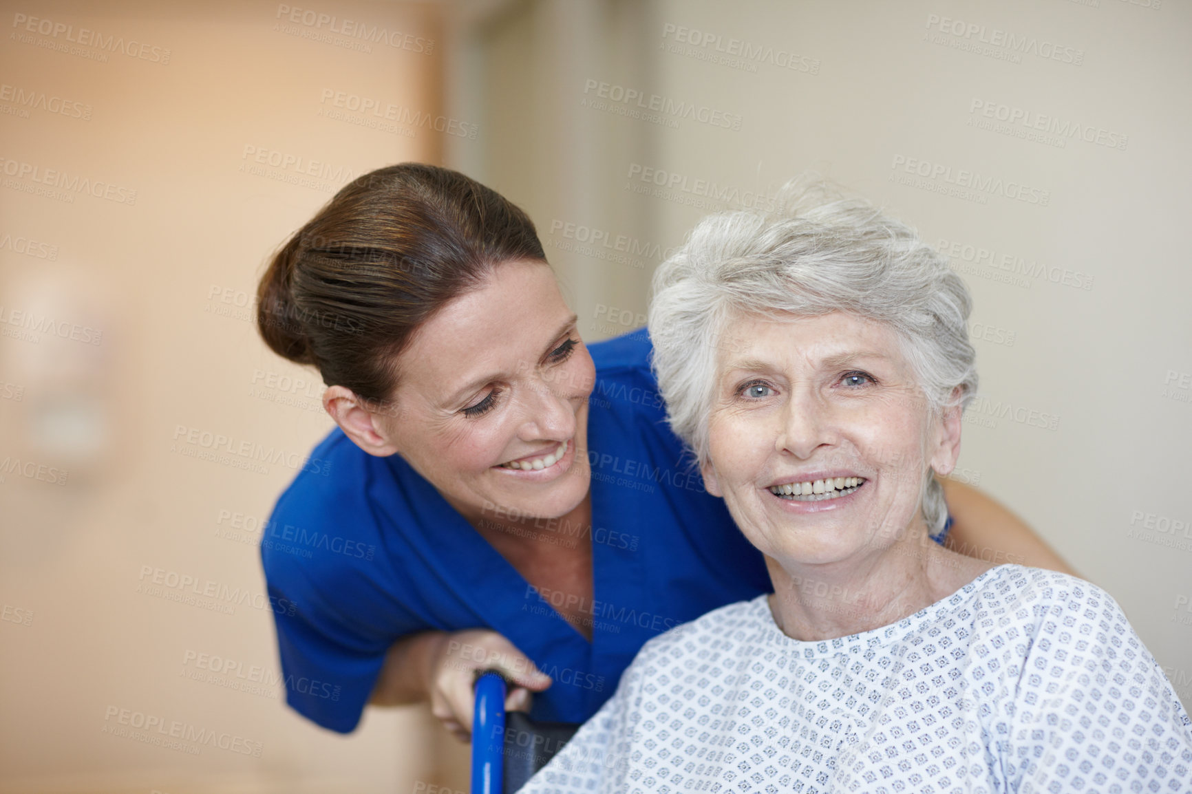 Buy stock photo Healthcare, nurse and senior woman in hospital, smile and happy for recovery, assisted living and joy. Sick, retirement and elderly person with disability, caregiver and help for patient in clinic