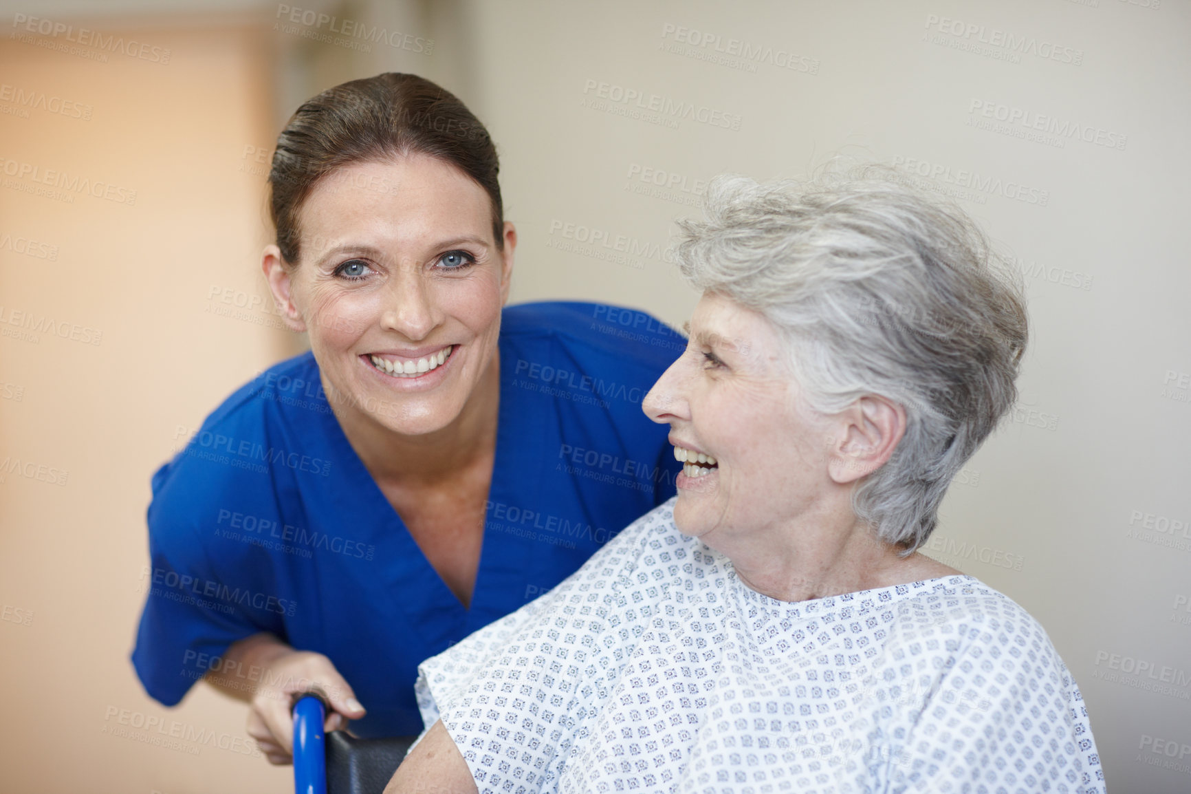 Buy stock photo Happy, nurse and senior woman in hospital, smile and healthcare for recovery, assisted living and joy. Sick, retirement and elderly person with disability, caregiver and help for patient in clinic