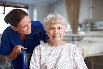 Buy stock photo Portrait of a senior patient with a nurse standing behind and looking at her