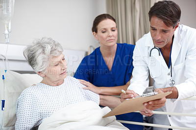 Buy stock photo Doctor, clipboard and senior patient in hospital bed for healthcare results, surgery information and bad news. Elderly woman, nurse and health support for diagnosis, illness update and compassion