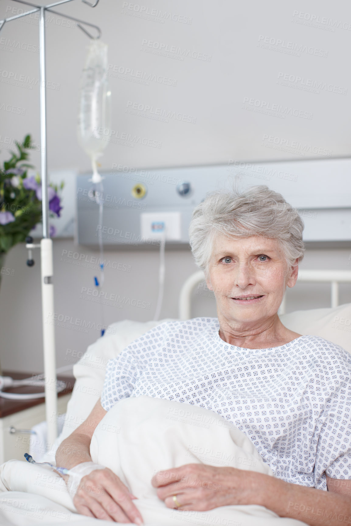 Buy stock photo Healthcare, senior woman and portrait in hospital bed for surgery recovery, rehabilitation and medical treatment. Elderly, person and smile with IV fluid for medication, health nutrients and healing