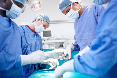 Buy stock photo Surgery, hospital and group of doctors in operating room for patient, emergency or operation. Healthcare people, collaboration and medical surgeons with surgical tools, teamwork and clinic service