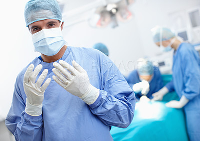 Buy stock photo Healthcare surgery and teamwork with man in hospital for doctors, operating room and emergency. Medical, organ transplant and portrait with person in theatre for clinic, procedure and face mask