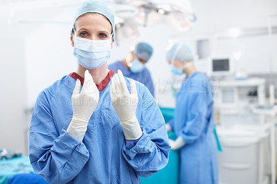 Buy stock photo Woman, scrubs or surgeons in portrait for surgery emergency accident or healthcare in hospital clinic. Medical, gloves or doctors in surgical mask in operating room for uniform, operation or help