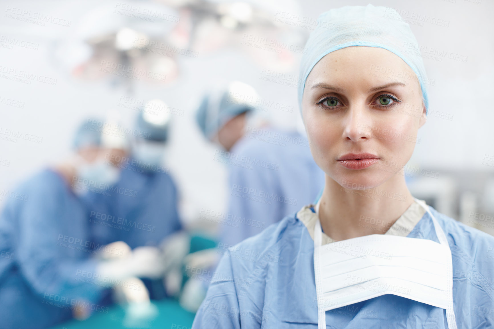 Buy stock photo Closeup portrait of a female surgeon with a serious look on her face - Copyspace