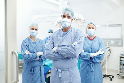 Buy stock photo Theater, doctors and portrait with face mask in hospital, medical surgery or procedure with pride. Team, surgeons and man leader with arms crossed for operating room, clinic or ppe uniform for safety