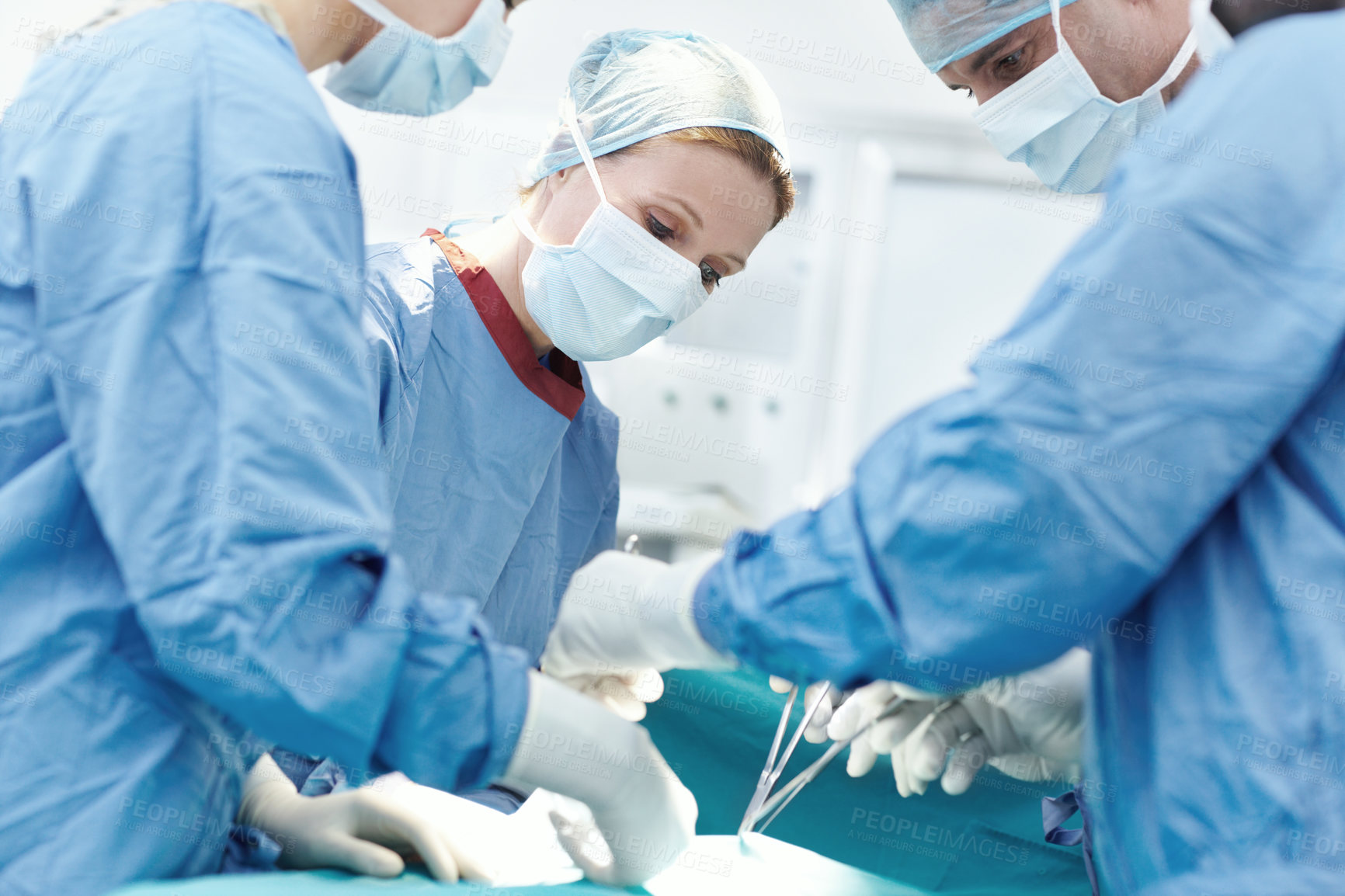Buy stock photo Surgery, hospital and doctors help in operating room for patient, emergency or operation. Healthcare people, collaboration and specialist advice with surgical equipment, teamwork and clinic service