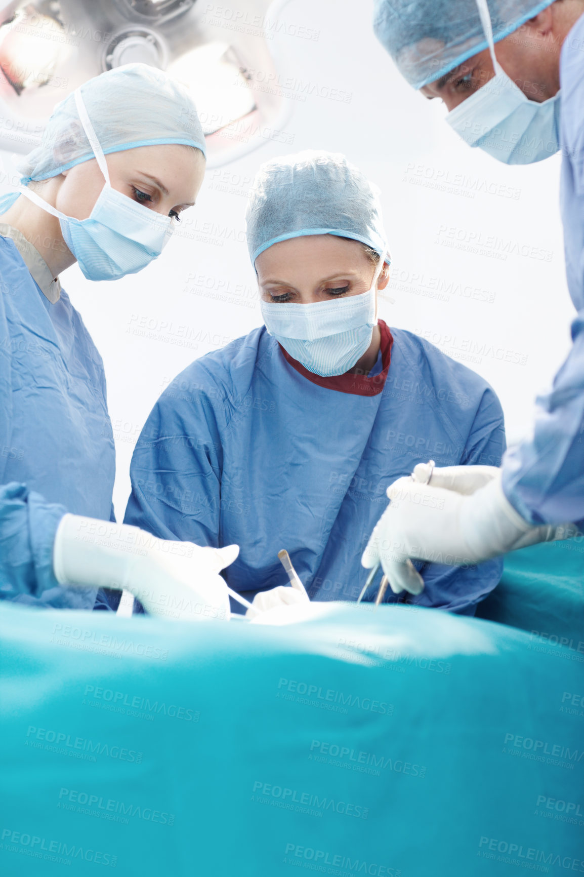 Buy stock photo Surgery, hospital and doctor procedure in operating room for patient, emergency or operation. Healthcare people, collaboration and medical surgeons with surgical tools, teamwork and clinic service