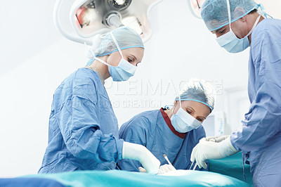 Buy stock photo Hospital, specialist and doctor procedure in operating room for patient, emergency or operation. Healthcare people, collaboration and medical surgeons with surgical tools, teamwork and clinic service