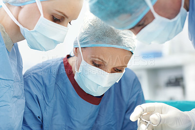 Buy stock photo People, operation or surgeons in theatre for surgery, emergency accident or healthcare in hospital clinic. Medical, mask or doctors in surgical scrubs in operating room for teamwork, cutting or help