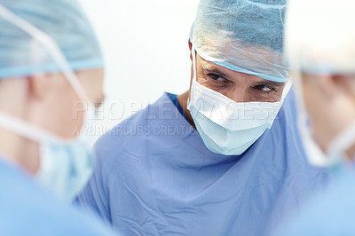 Buy stock photo People, man or surgeons in operation for surgery, emergency accident or healthcare in hospital theatre. Medical, clinic or doctors in surgical scrubs in operating room for teamwork, support or help