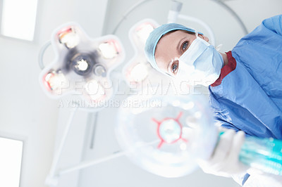 Buy stock photo Patient's view of a medical surgeon/nurse putting them under a general anaesthetic
