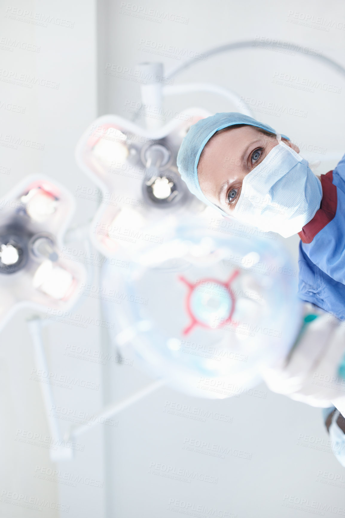 Buy stock photo Doctor, oxygen and mask for operation in theatre with anaesthesia safety, emergency procedure and ppe. Below, woman and gas machine for sleeping, surgery and medical treatment with healthcare service