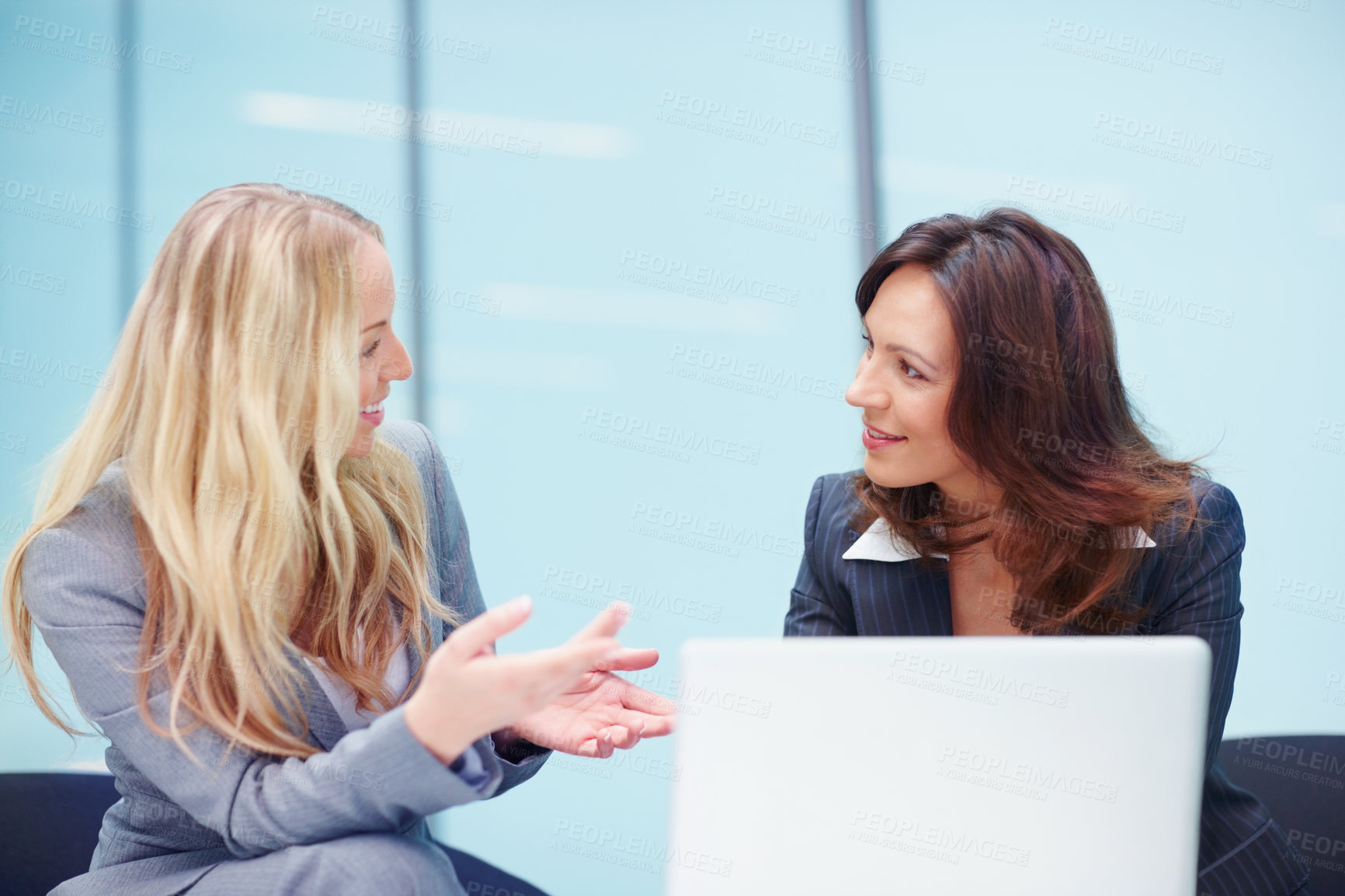 Buy stock photo Business, women and explain with laptop in office of accounting, reading information and finance report. People, meeting and online feedback of company proposal, investment schedule and project ideas