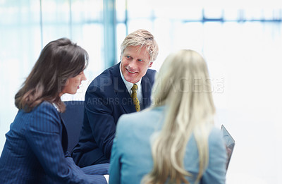 Buy stock photo Three business coworkers in a meeting