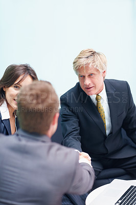 Buy stock photo Law firm, consulting and people shaking hands for court case planning, strategy discussion or communication. Business man, corporate lawyer and handshake for evidence review or legal conversation