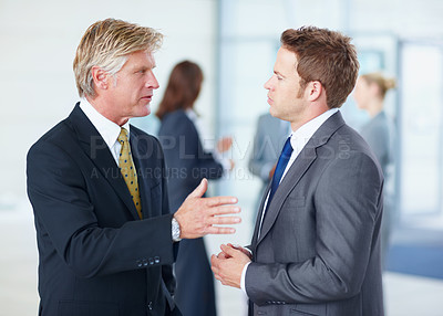 Buy stock photo Meeting, office and business men in discussion for planning, teamwork and project idea with manager. Corporate, professional and workers in conversation for collaboration, feedback and career advice