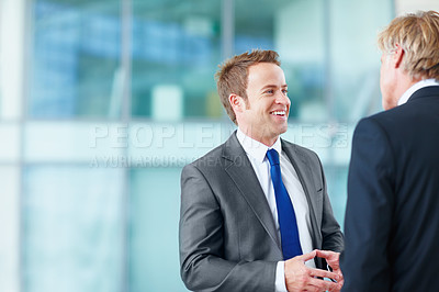 Buy stock photo Talking, meeting or business people with happy man or legal team for court case, research or support. Smile, corporate or lawyers in office with attorney or advisor at law firm for review or feedback