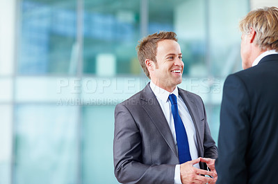 Buy stock photo Speaking, meeting or business people with happy man or legal team for court case, talk or support. Smile, corporate or lawyers in office with attorney or advisor at law firm for review or feedback
