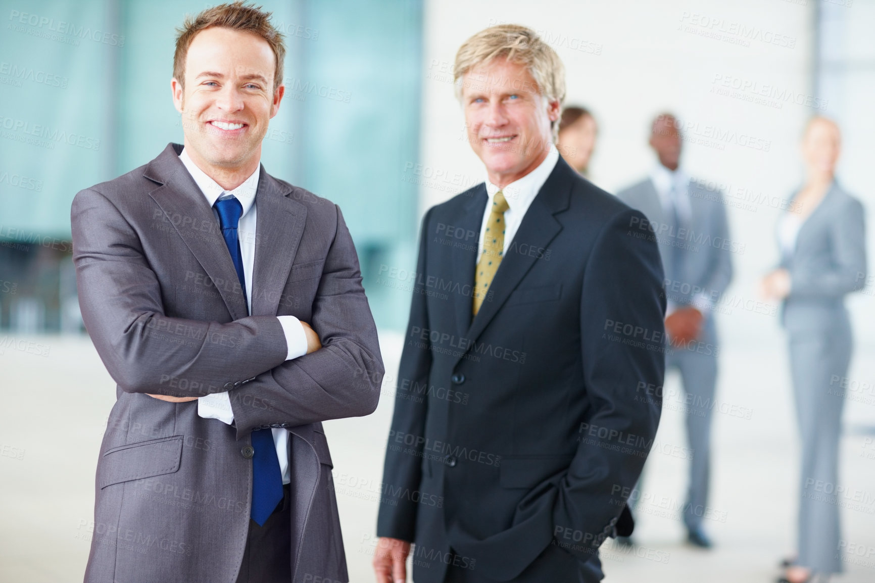 Buy stock photo Portrait of smiling business men with colleagues in background
