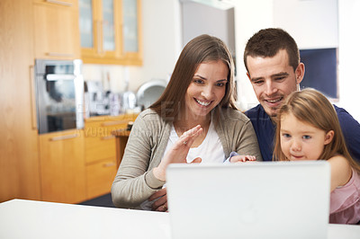 Buy stock photo Family, child and wave for laptop for video call, talking or online communication in home. Kid, dad or mom with hello greeting on technology for virtual conversation, connection or bonding together