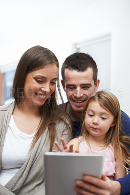 Buy stock photo Home, father and mother with child for tablet, educational video and streaming service for cartoon. House, dad and mom with girl for game subscription, ebook or bonding with entertainment application