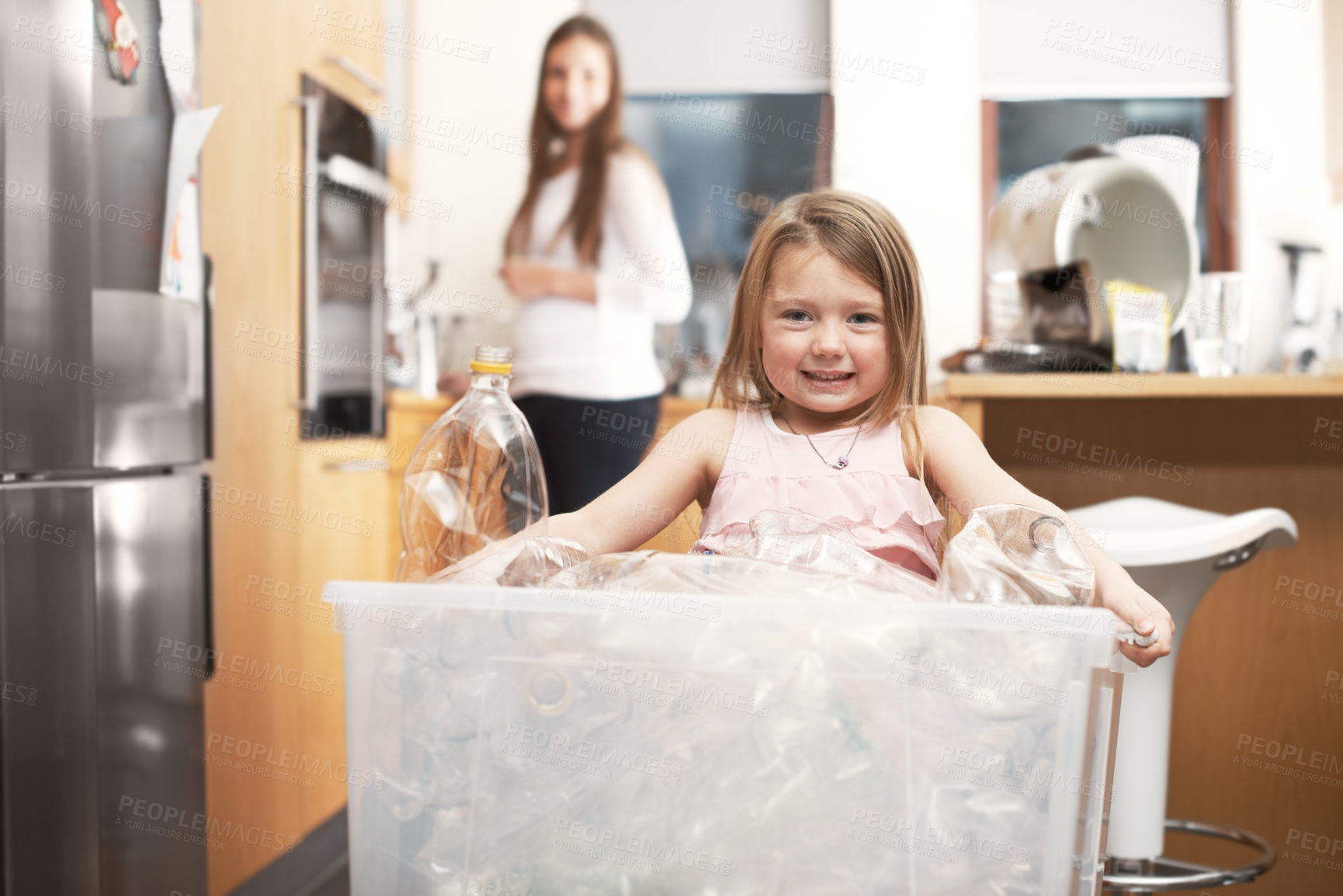 Buy stock photo Portrait, child and container of recycle plastic for cleaning process, recycling trash and house pollution. Smile, girl and helping mother for waste removal, eco friendly activity and teaching habits