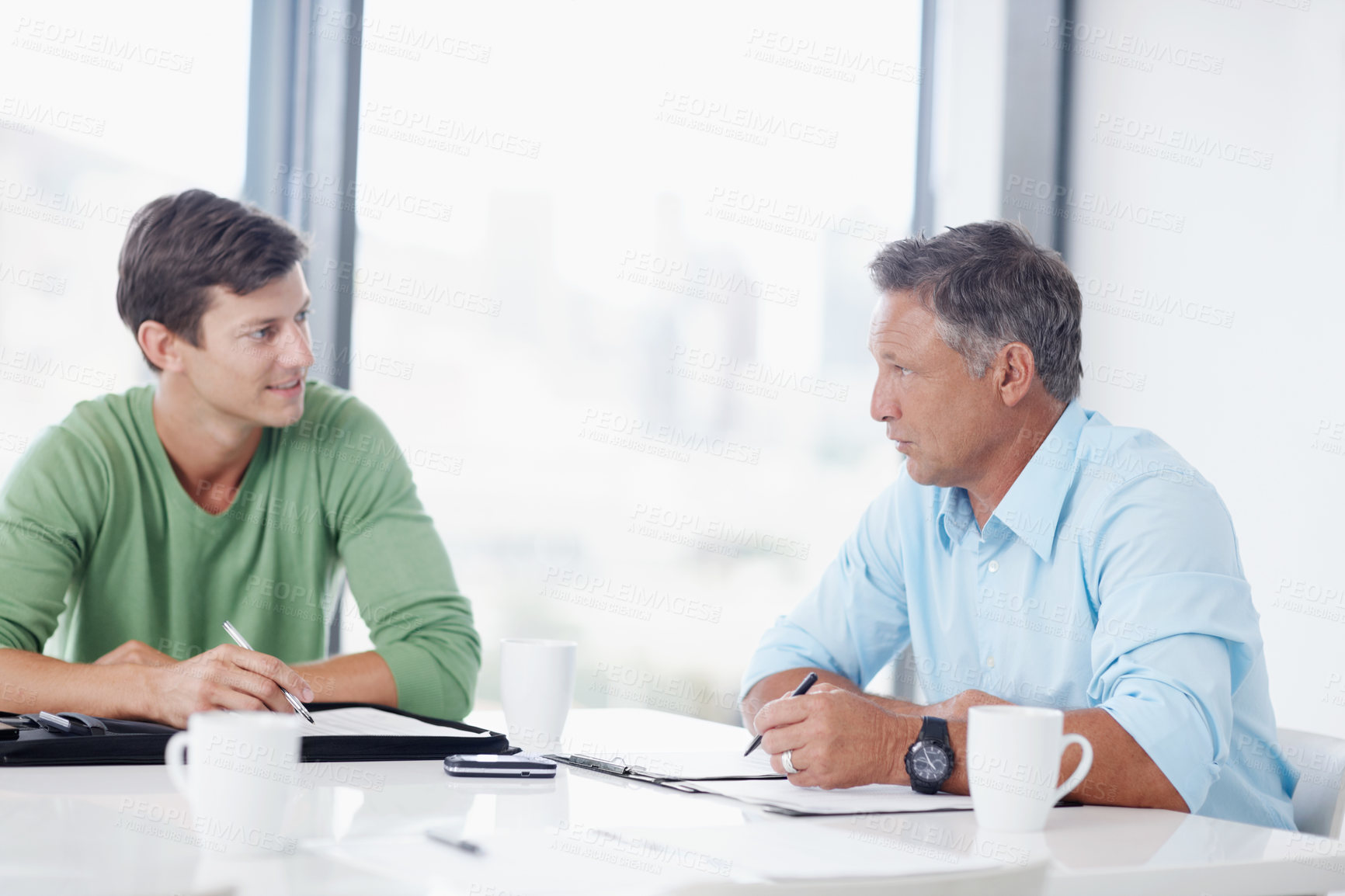 Buy stock photo Discussion, notes and client in office, men and event planner with budget for company or communication. Writing, people and feedback for ideas in boardroom, planning and talking in business meeting