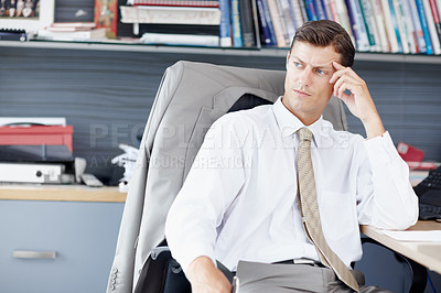 Buy stock photo A young executive struggling with a problem at work - Copyspace