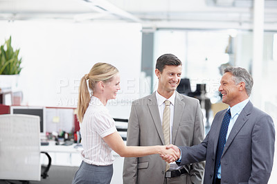 Buy stock photo A new employee meeting her colleagues at the office