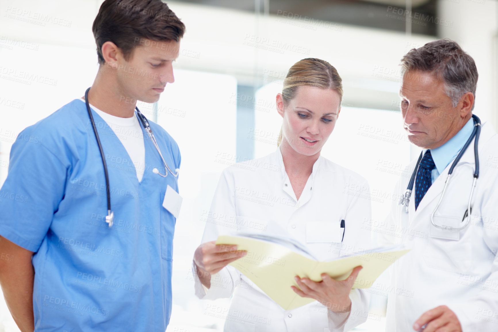 Buy stock photo Doctors, team and files with people in hospital for patient treatment plan, consulting and healthcare. Diagnostic advice, medical intern and nurse with men and woman in clinic for blood test results