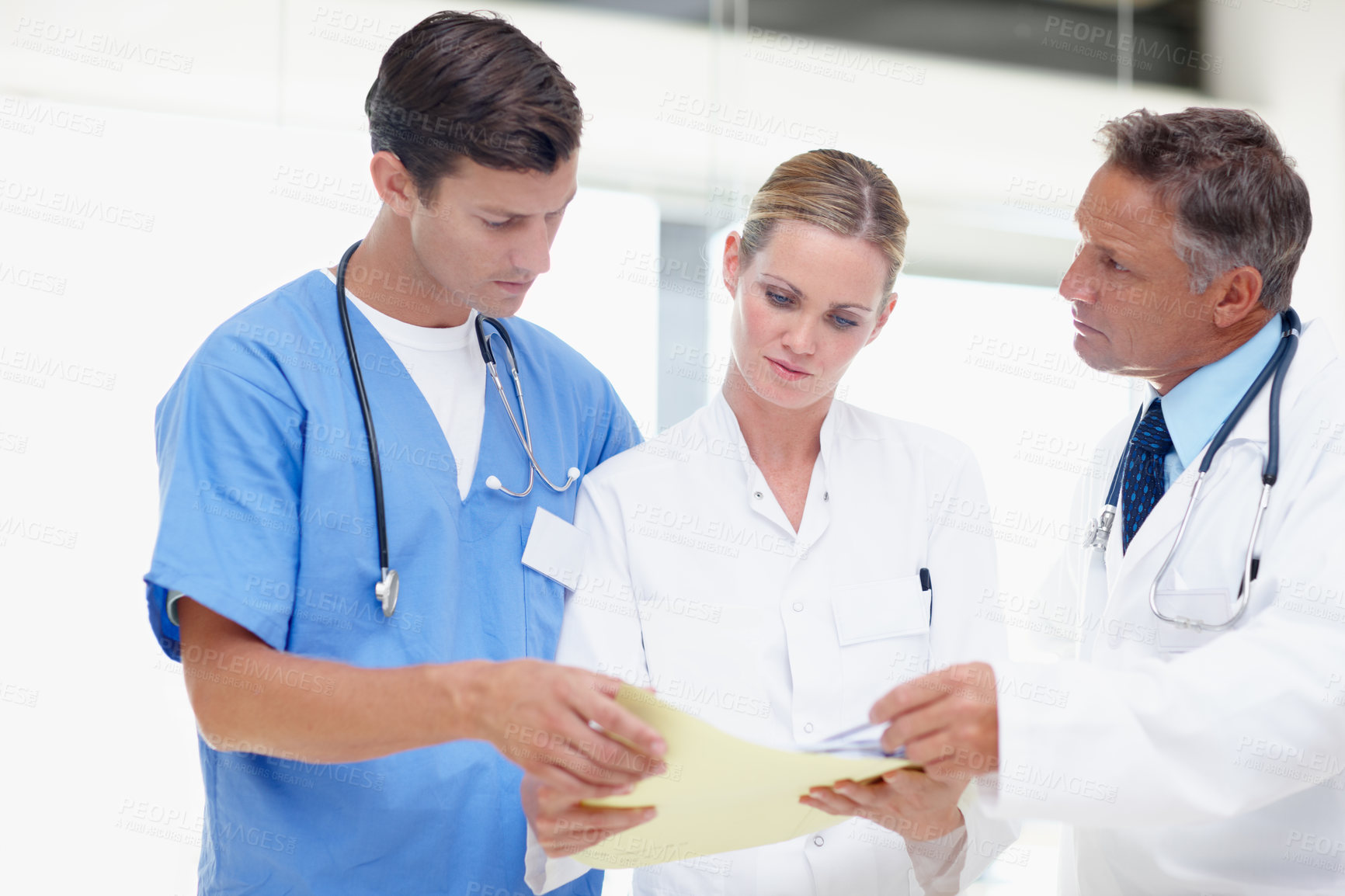 Buy stock photo Doctors, research and files with people in hospital for patient treatment plan, consulting and healthcare. Diagnostic advice, medical intern and nurse with men and woman in clinic for test results