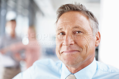 Buy stock photo Portrait of a senior business manager smiling confidently - Copyspace