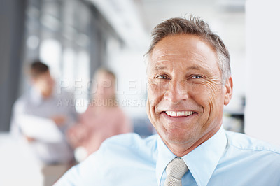 Buy stock photo Portrait of a senior business manager laughing happily in the office - Copyspace