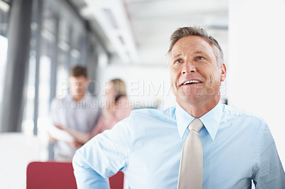 Buy stock photo A senior business manager smiling and looking away - Copyspace